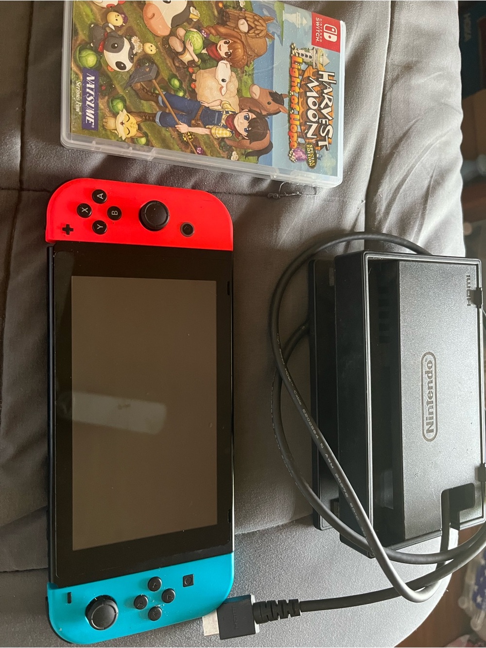 Nintendo Switch with Neon Blue & Neon Red Joy‑Con Controllers and Dock